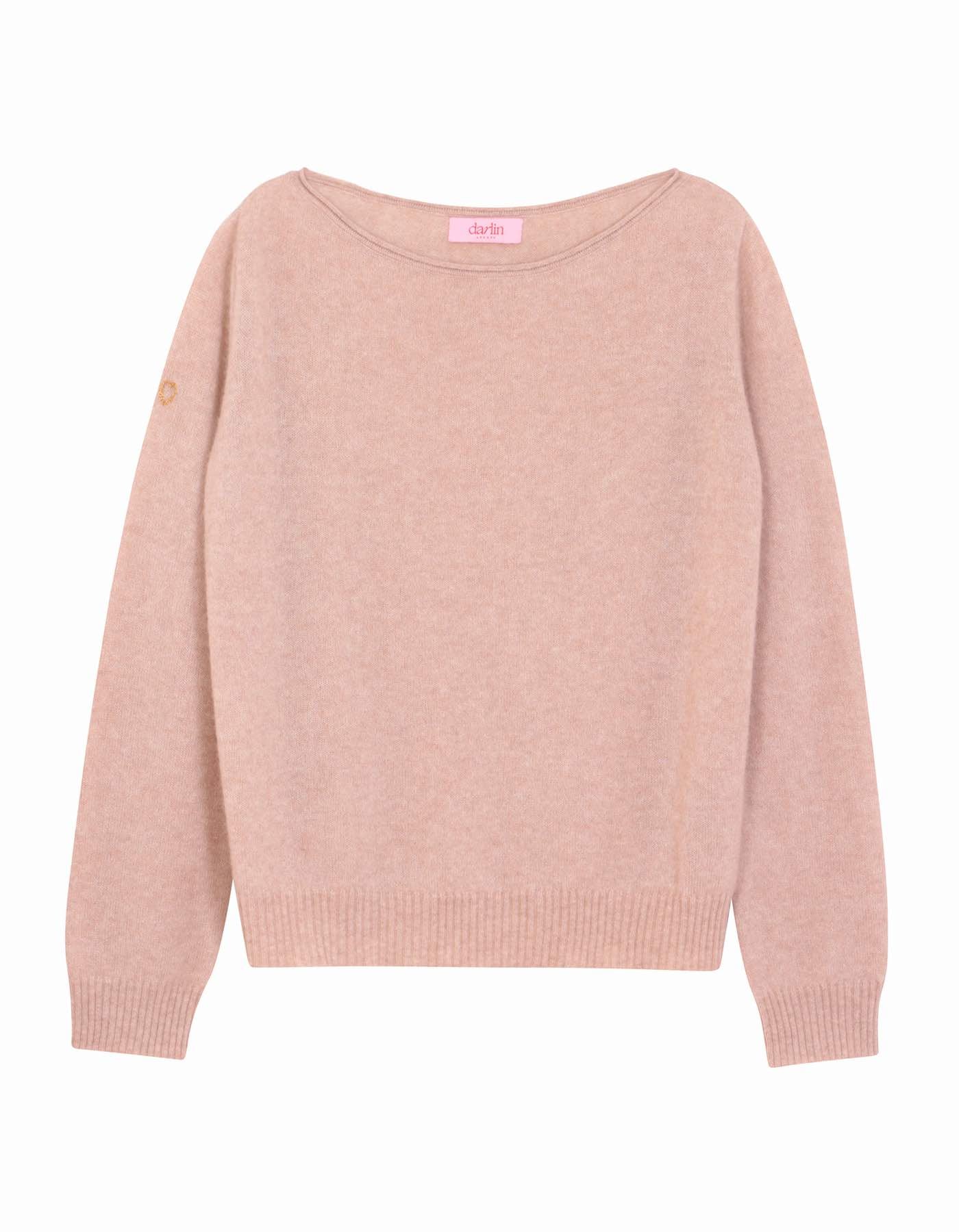 Light beige sweater on a white background