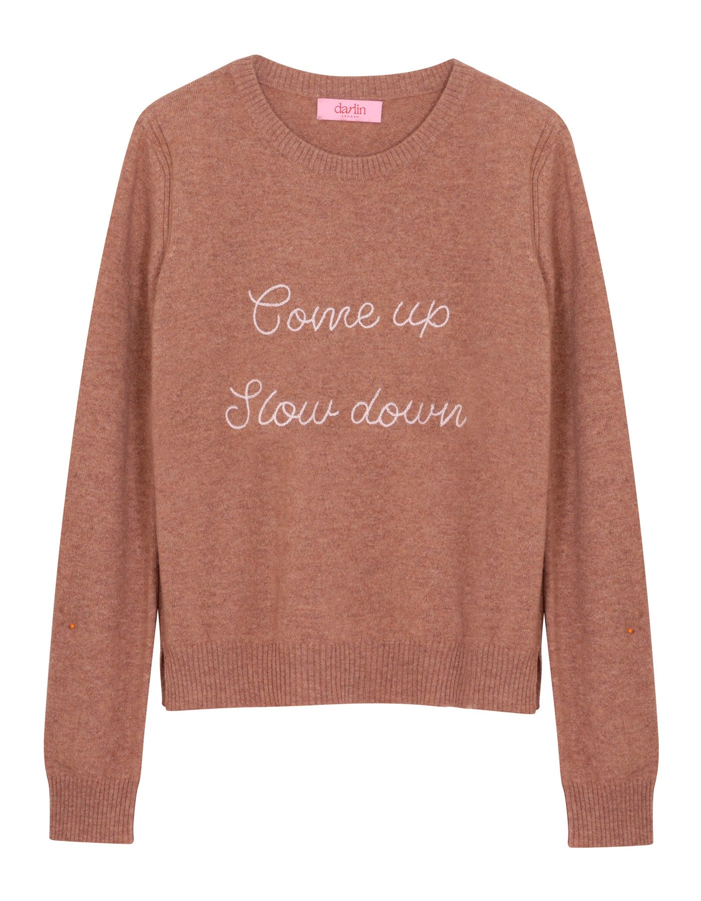 Beige sweater with 'Come up Slow down' text on a white background